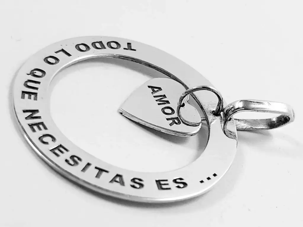 Dije Argolla Corazón colgando 