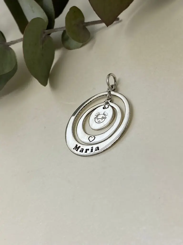 Dije argollas y medalla nena