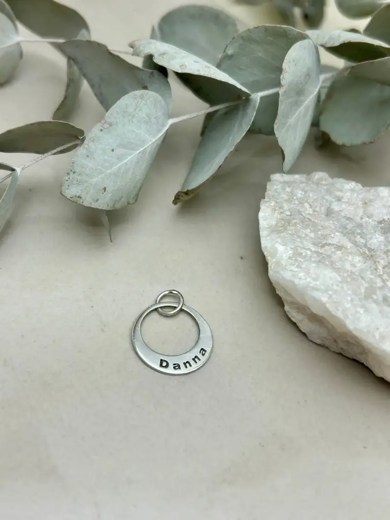 Dije argolla caida x1