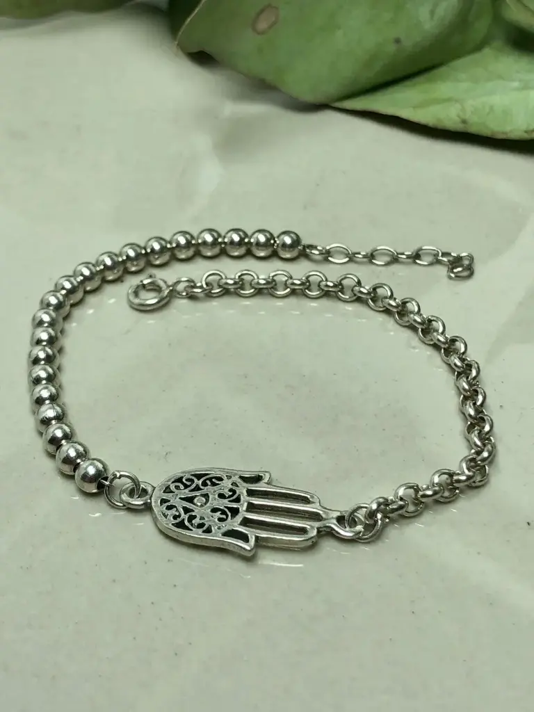 Pulsera rolo mano de fatima c/bolitas